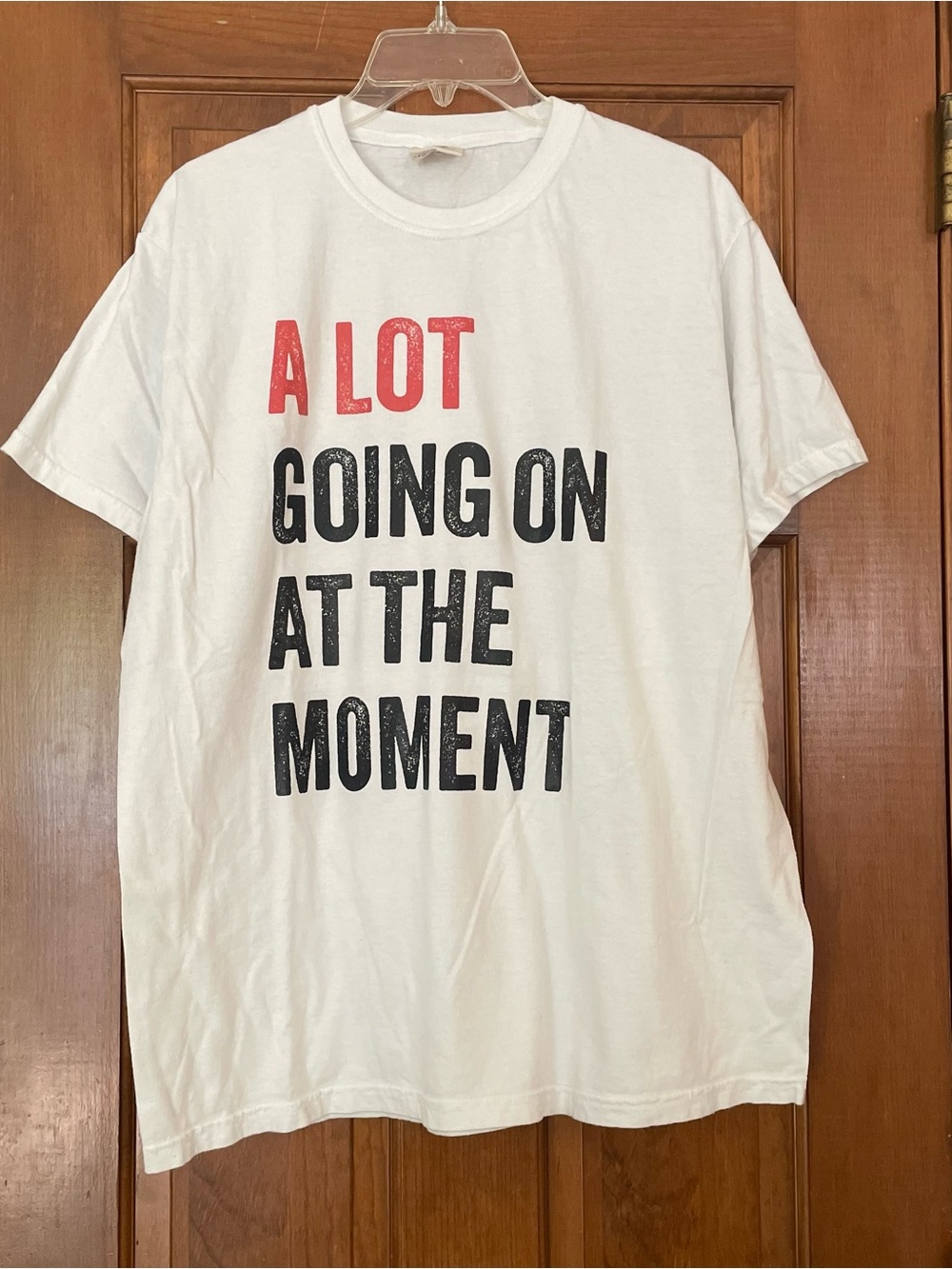 Comfort Colors Women’s White Graphic Tee "A LOT GOING ON AT THE MOMENT", Size L